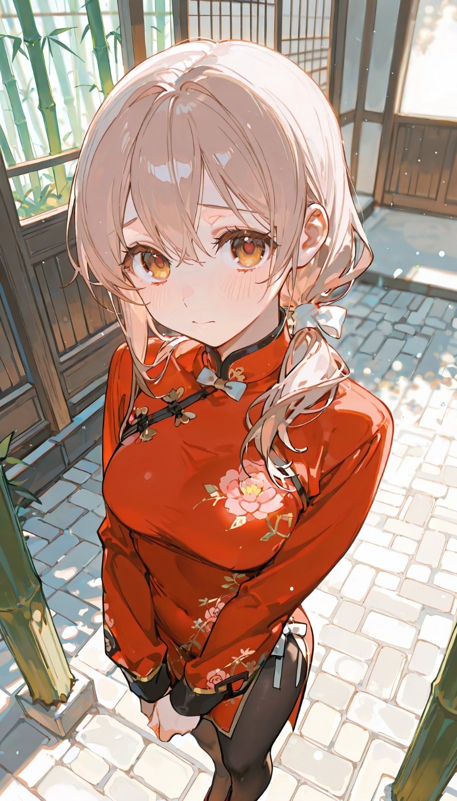 A girl in a red embroidered qipao