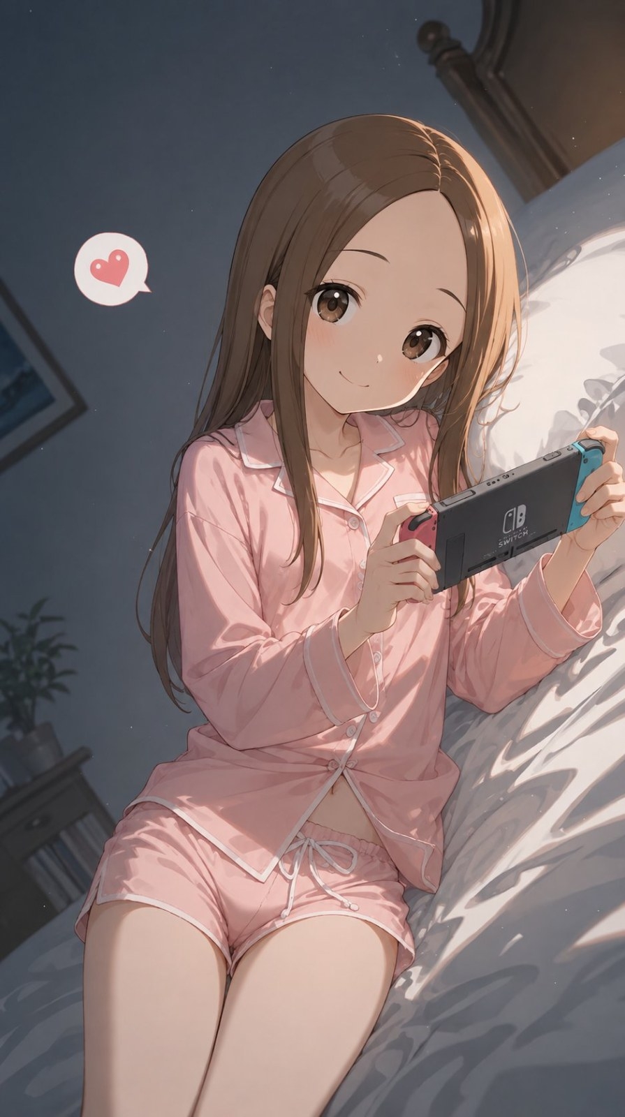 Una chica en pijama rosa está sentada en una cama jugando con una consola de videojuegos portátil